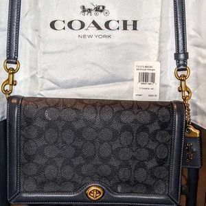 Coach Riley In Signature Canvas Handbag